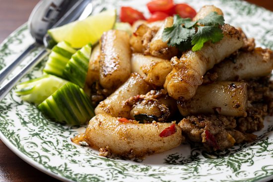 Pad kee mao made with rolled rice noodles.