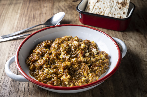 Mirza ghasemi (a loose tangle of
eggplant and lightly whisked egg) with lavash flatbread (top right).