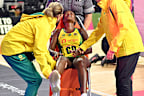 Sunday Aryang receives medical help.