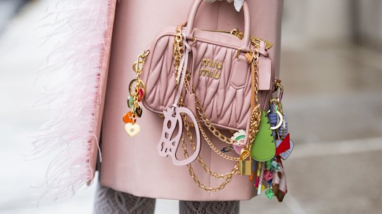 New York fashion expert Anna Estrin shows off some chaotic customistation on her pink Miu Miu bag.