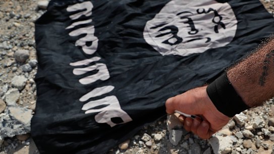 File photo of the Islamic State flag in Syria.