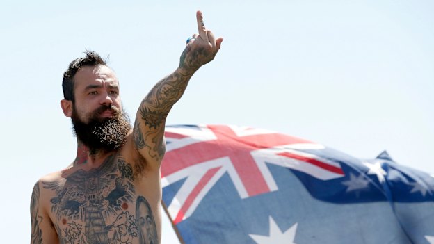 A protestor at a recent rally in St Kilda, which has thrown the spotlight on the far-right movement in Australia. 