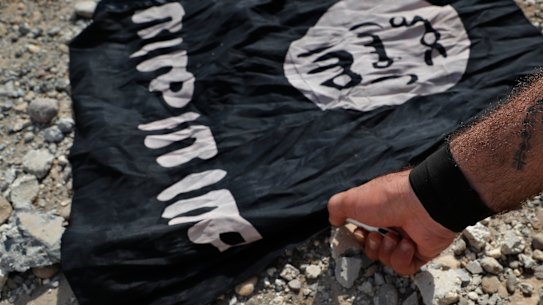 File photo of the Islamic State flag in Syria.