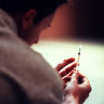 A suspected case of botulism in a woman in Sydney is believed to be linked to an unregulated anti-wrinkle injection she received at a residential premises.