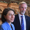 Then premier Gladys Berejiklian with Professor Andrew McNaughton and then transport minister Andrew Constance, announcing the review in 2018.