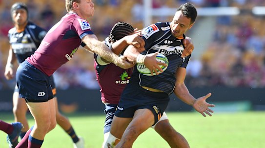 Brumbies winger Lausii Taliauli in action against the Queensland Reds. 