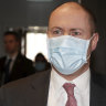 Treasurer Josh Frydenberg arrives wearing a mask for his address to the National Press Club of Australia in Canberra on Friday.