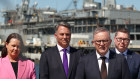 Prime Minister Anthony Albanese, second from right, at the Garden Island naval base with ministers Madeleine King, Richard Marles and Pat Conroy on Monday.