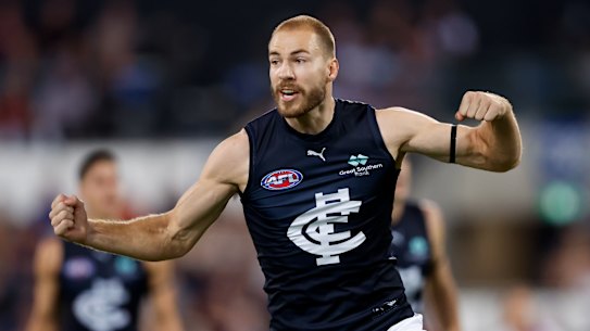 Harry McKay of the Blues celebrates a goal during the 2024 AFL Opening Round against the Lions.