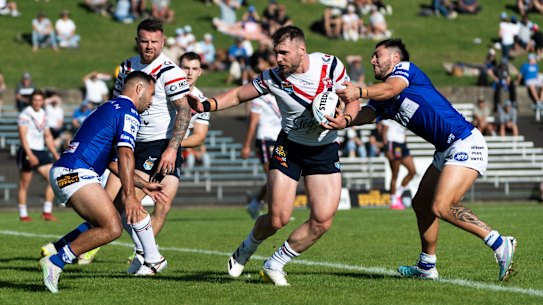 Angus Crichton hits the ball up in his first game since last year’s World Cup.