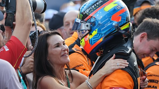 Oscar Piastri embraces his mother, Nicole, after his win in Baku.