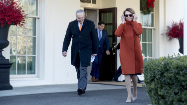Nancy Pelosi and and Senate Minority Leader Chuck Schumer leave the White House after the meeting with US President Donald Trump.