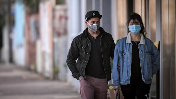 People on Lygon Street in Carlton on Wednesday, one week in Melbourne's lockdown 2.0.