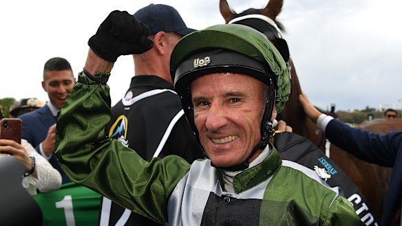 Glen Boss celebrates after guiding Yes Yes Yes to victory in The Everest.