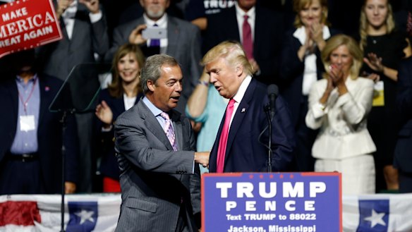 Donald Trump welcomes Nigel Farage to the podium during the 2016 election campaign.