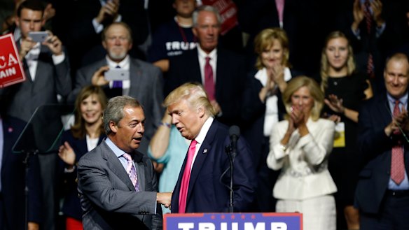 Donald Trump welcomes Nigel Farage to the podium during the 2016 US election campaign.