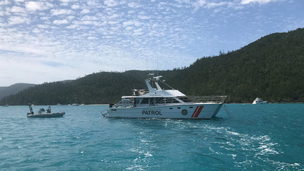 Queensland Boating and Fisheries boats patrolling Cid Harbour on Friday.