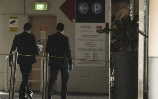 NSW Police arrive at the Novotel Darling Harbour on Thursday morning. The location is one of two hotels where the infected woman worked. 