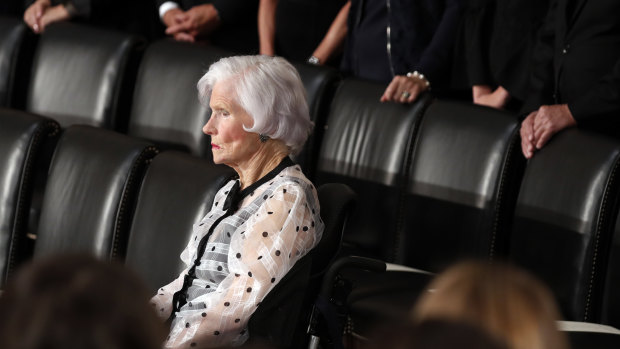 Roberta McCain, mother of Senator John McCain, is seated before his casket arrives to lie in state in the Rotunda of the US Capitol.