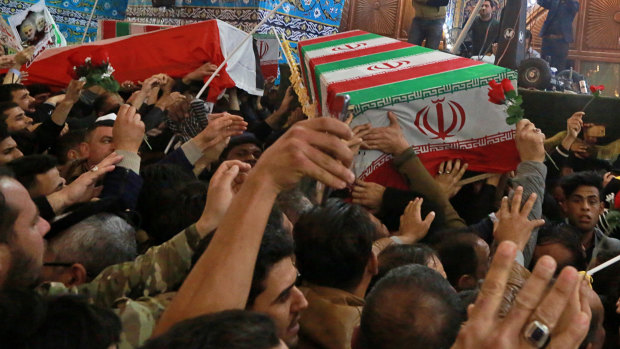 Mourners carry the coffins of Iran's top general Qassem Soleimani and Abu Mahdi al-Muhandis, deputy commander of Iran-backed militias in Iraq, during their funeral in the shrine of Imam Hussein in Karbala, Iraq on January 4.