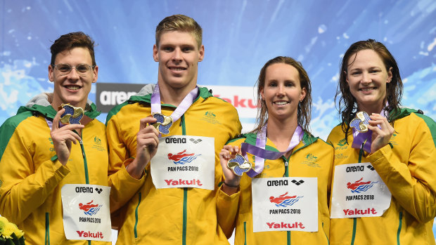Mixed result: Australia medley relay winning team of (from left) Mitch Larkin, Jake Packard, Emma Mckeon and Cate Campbell.