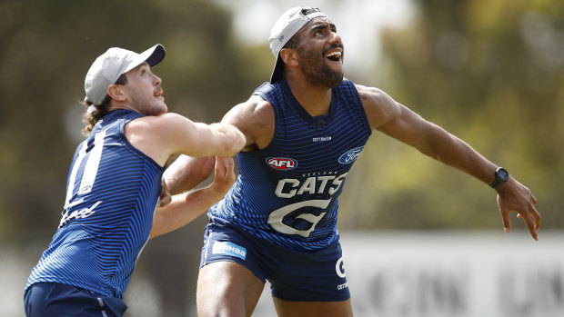 Esava Ratugolea battled with Cats recruit Jack Steven as training on Tuesday.