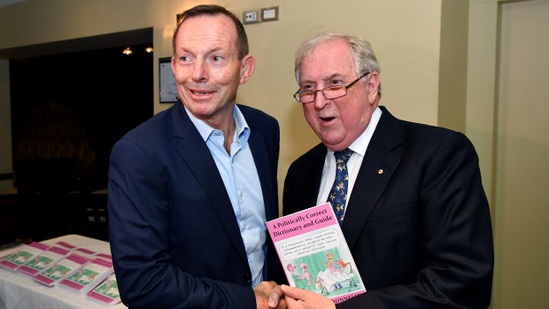 Former prime minister Tony Abbott greets author Kevin Donnelly during the book launch in Sydney.