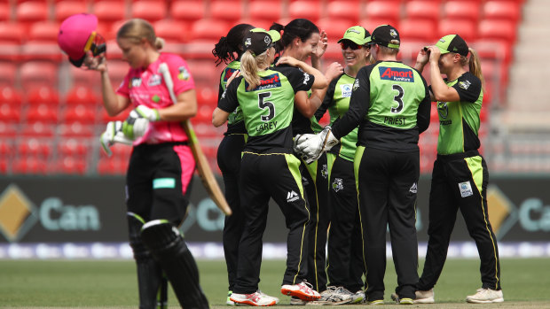 Thunderstruck: Lisa Griffith and her teammates celebrate the dismissal of Sixers star Ellyse Perry.