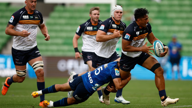 Pete Samu is tackled by an opponent in the Brumbies’ 25-20 win over the Blues.