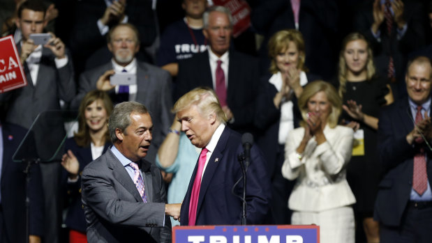 Donald Trump welcomes Nigel Farage to the podium during the 2016 US election campaign.