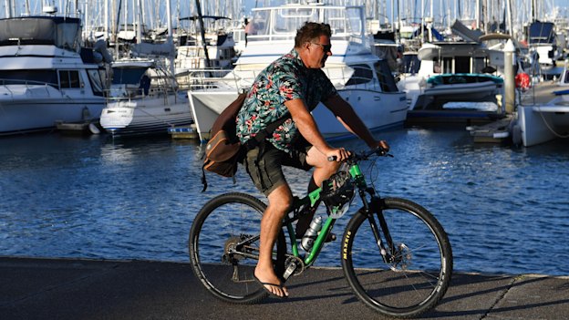 A man out for a ride at Manly Boat Harbour in Brisbane in early May.