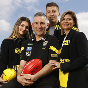 Richmond coach Adem Yze with his children Jasmine and Noah, and wife Afijet.