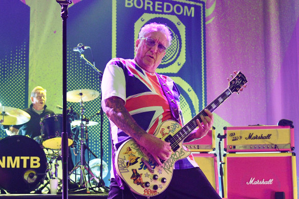 Jones on stage last year with original Sex Pistols members Glen Matlock and Paul Cook.