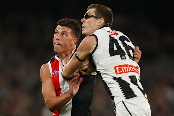 Rowen Marshall and Mason Cox wrestle in a ruck contest.