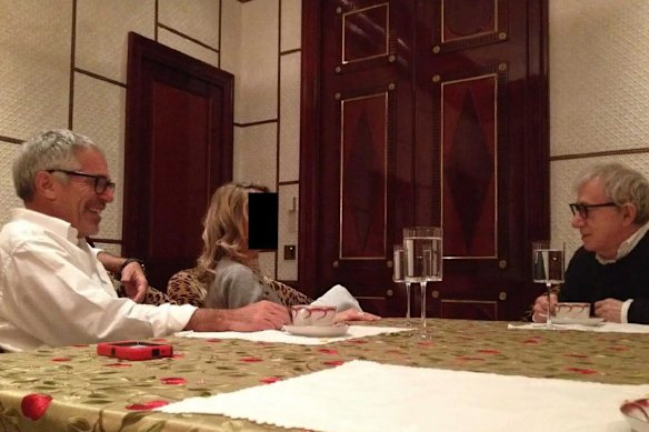 An image, released by the US House oversight committee Democrats, shows Jeffrey Epstein and Woody Allen sitting across a table from each other.