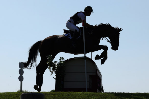 Rose riding Virgil clears a jump during the cross-country eventing on Saturday.