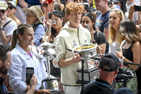 Reigning champions Aryna Sabalenka and Jannik Sinner bring the trophies along to the official 2025 draw ceremony.