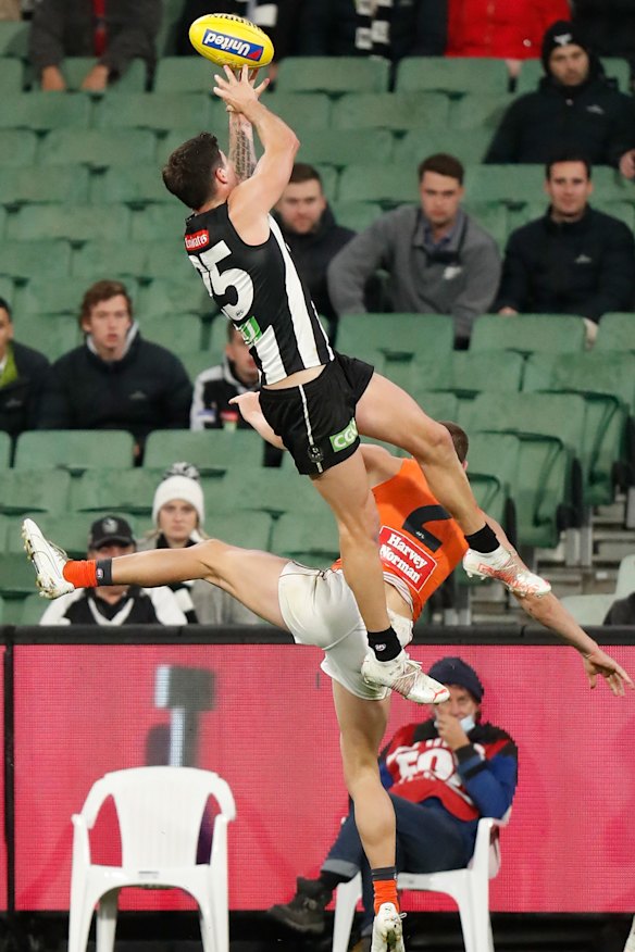 Jack Crisp flies high for the Magpies.