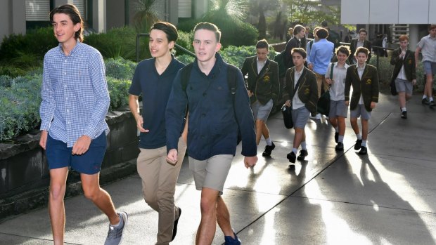 Some of the Trinity students in 'smart casual' dress protest the sacking of their vice principal.