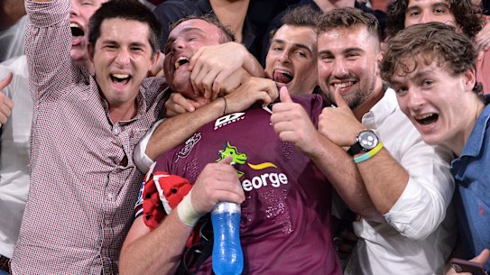 Jubilant home fans celebrates with the Reds' Harry Wilson on Saturday night.