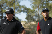 Phil Mickelson and Tiger Woods in happier times in 2018.
