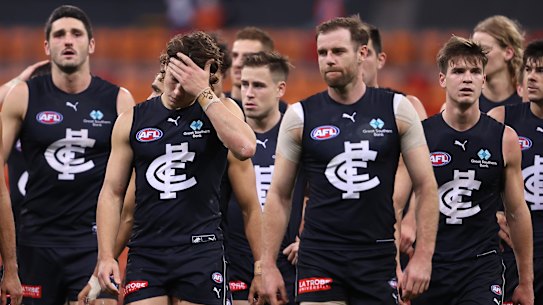 Blues players look dejected after losing to the Giants.