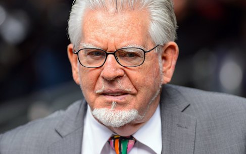 Veteran entertainer Rolf Harris, arrives at Southwark Crown Court to be sentenced, in London, Friday, July 4, 2014. Australian-born Harris, 84, was found guilty of 12 counts of indecent assault on four victims aged 19 or under between 1968 and 1986.