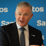 Santos shares tumble despite record interim dividend