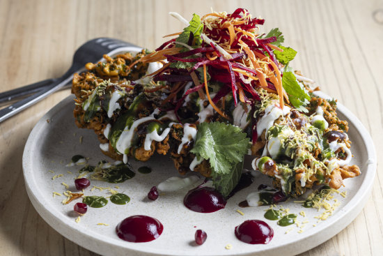Kale chips battered in chickpea flour, with beetroot puree and drizzled with a trio of chutneys.