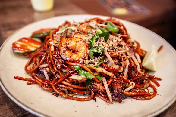 Buzzing with vivid, slow burning chilli, Mamak Goreng’s mee goreng mamak is a splendid example of its genre.