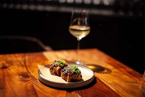 Singaporean chilli crab toast, a street smart remake of the ubiquitous prawn toast.