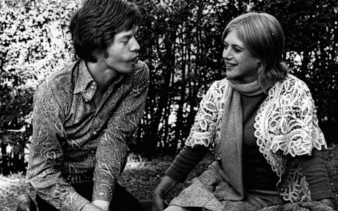 Marianne Faithful and Mick Jagger relax in the sun at Mount Street Margaret hospital, Ryde on July 27, 1969