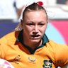 Maddi Levi, with a strapped knee, scoring a try in the final against New Zealand.