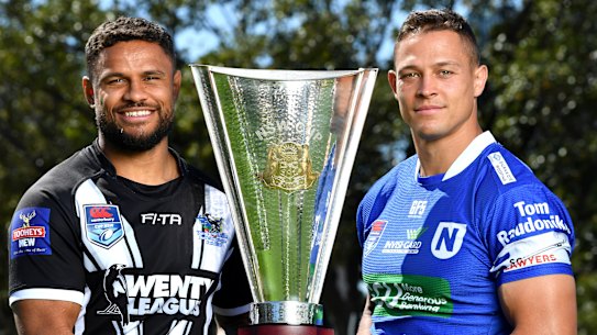 Newtown's Scott Sorenson and Wentworthville's Josh Hoffman with the Canterbury Cup. Tom Raudonikis can be seen on the Newtown sleeve.